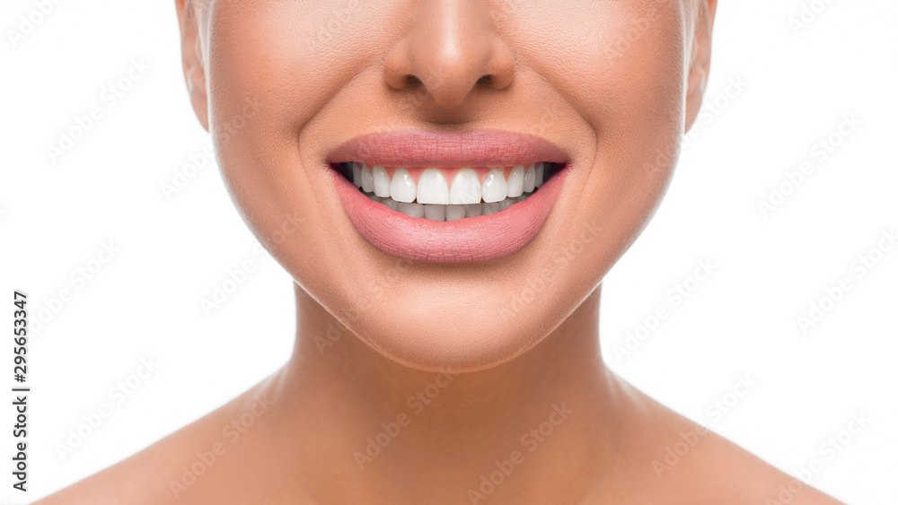 Happy smiling woman with perfect teeth. Close up view. Dental health concept. Happy smiling woman with perfect teeth. Close up view. Dental health concept.