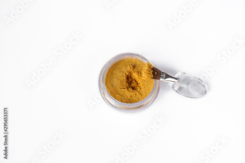 Bild auf Leinwand Gold eye shadows and eye brush  isolated on white background