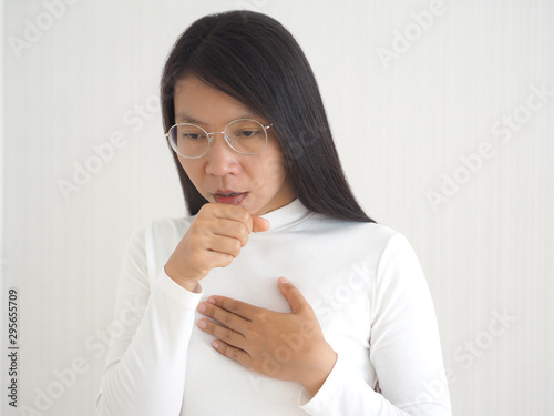 pleural effusion,tuberculosis and pulmonary embolism in asian woman and symptom of cough use for medicine product background and banner design or health care concept. photo