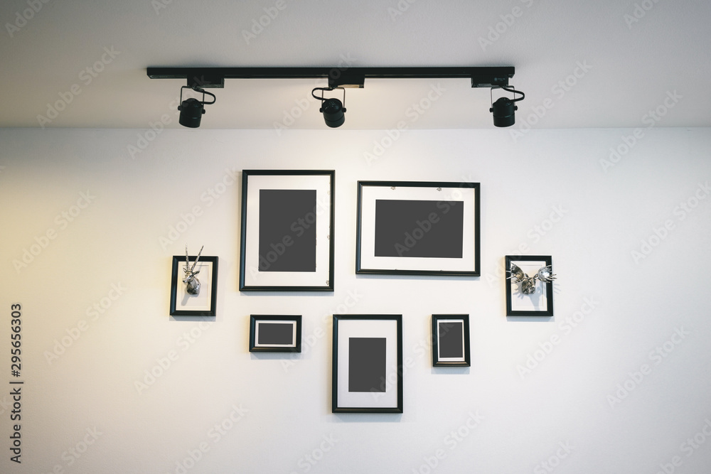 Photo Frame On Wall with studio light Photo Frame On Wall with studio light