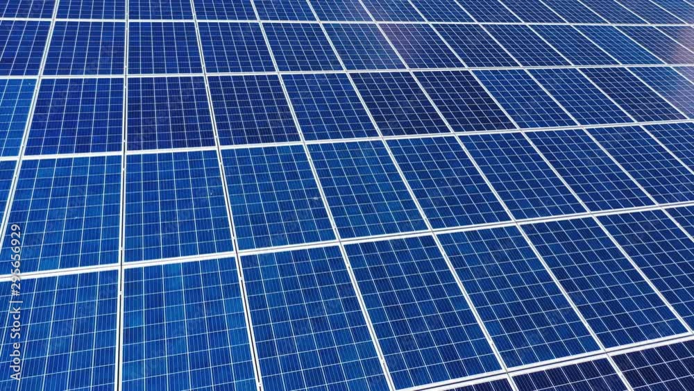 Blue solar panel close-up. Alternative source of electricity on solar energy farm. Source of ecological renewable energy. Blue solar panel close-up. Alternative source of electricity on solar energy farm. Source of ecological renewable energy.