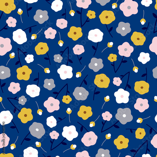 Vector seamless pattern of white, mustard, pink and pale grey flowers on a blue background. Great for dressmaking and home decor fabric.