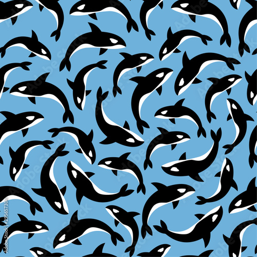 Vector seamless pattern of killer whales orca on a bright blue background. Great for sea and nautical themed decorations, textiles and stationery.