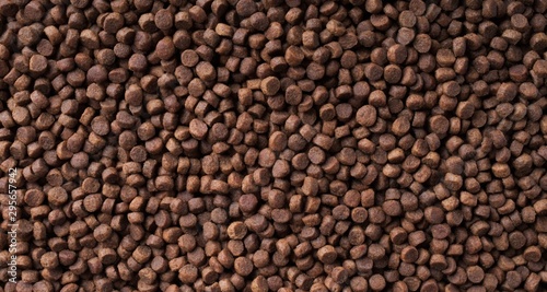 Dry food for cats and dogs. Pet meal background texture.