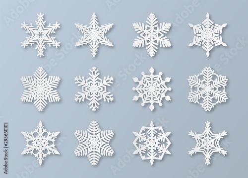Paper snowflakes. New year and christmas papercut 3d snowflake elements. White winter snow ornament decoration, origami vector set