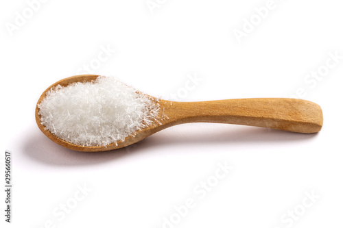 monosodium glutamate, MSG on wooden spoon Isolated on white background photo