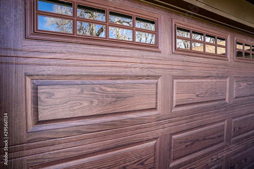 Custom wood looking garage door with windows