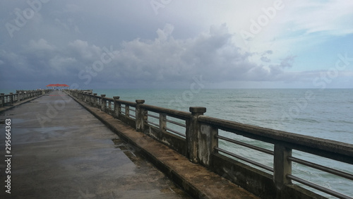 Pier with sea  sky and cloud at Natai beach  Phang-nga provience  Thailand. Quite  peaceful and beautiful place.