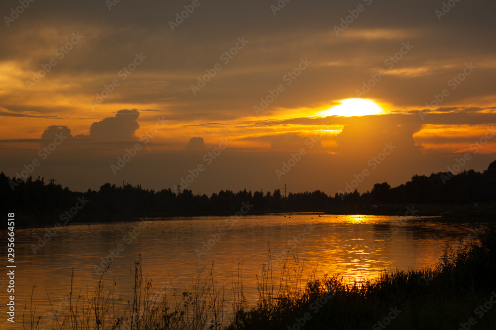Summer sunset over a quiet river