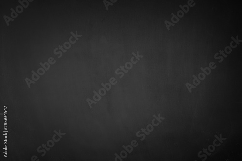 Blank front Real black chalkboard background texture in college concept for back to school kid wallpaper for create white chalk text draw graphic. Empty old back wall education blackboard.