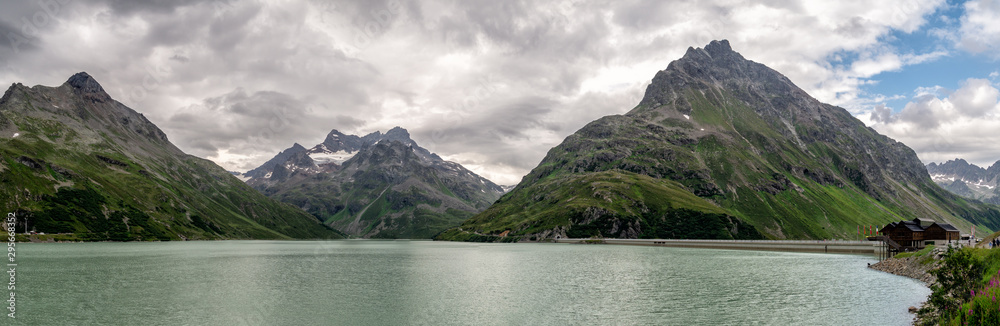 Picturesque mountain range and Silvretta Stausee lake in the Austrian Alps