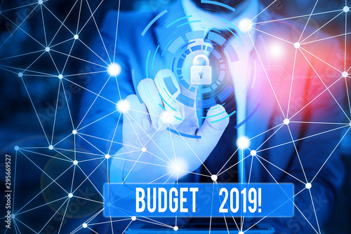 Writing note showing Budget 2019. Business concept for estimate of income and expenditure for current year Picture photo network scheme with modern smart device