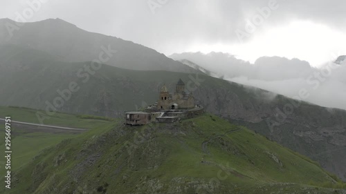 Kazberi Miuntains Gergeti Trinity Church in Georgia drone flight photo