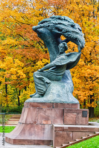 WARSAW, POLAND - OCTOBER 26, 2016: Fryderyk Chopin monument in autumn scenery of the Royal Lazienki Park in Warsaw, Poland, designed around 1904 by Waclaw Szymanowski (1859-1930).