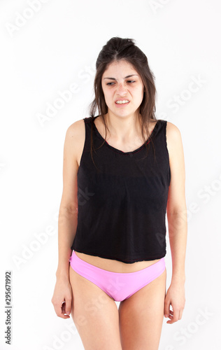 Contempt emotional girl on a light background
