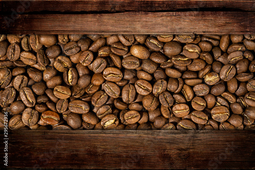 texture of coffee on a background of dark wood