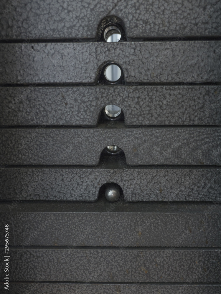 Close up iron heavy plates in a fitness gym