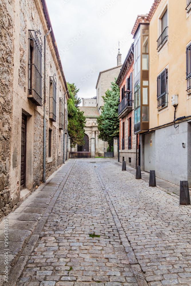 Narrow street in the old town of Avila, Spain.