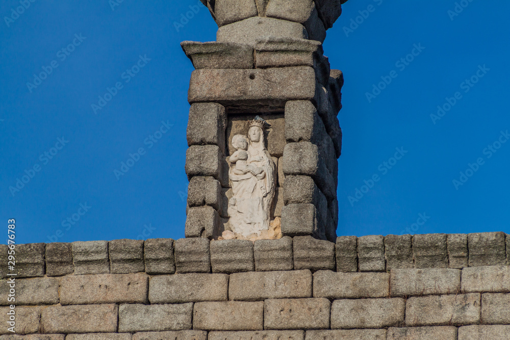 Statuette at of the Roman Aqueduct in Segovia, Spain