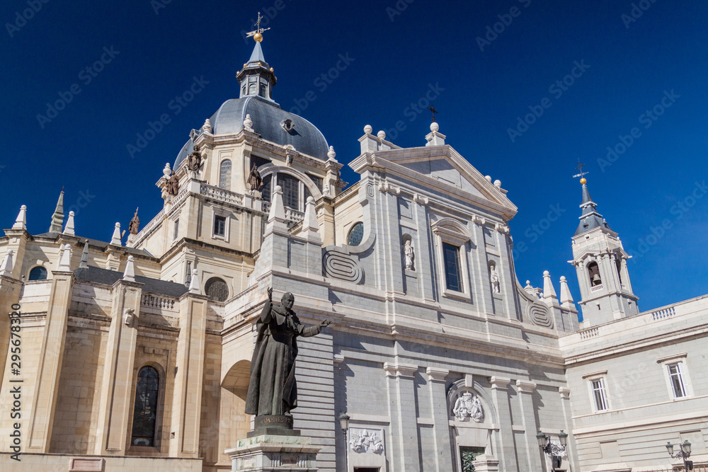 Catedral de la Almudena cathedral and John Paul II statue in Madrid, Spain