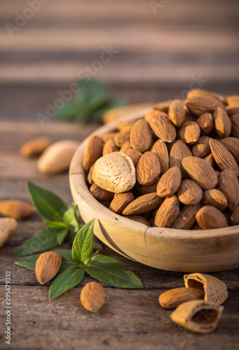 Fotobehang Fresh almonds in the wooden bowl
