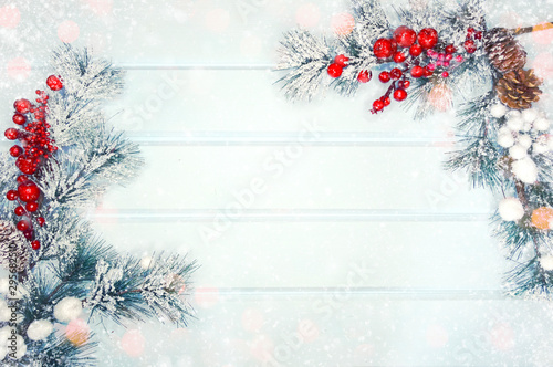 winter background with fir branches cones and snow