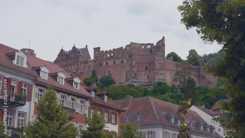 A low angle view of the Heidelberg Castle on the slopes above the Kornmarkt. Germany A low angle view of the Heidelberg Castle on the slopes above the Kornmarkt. Germany