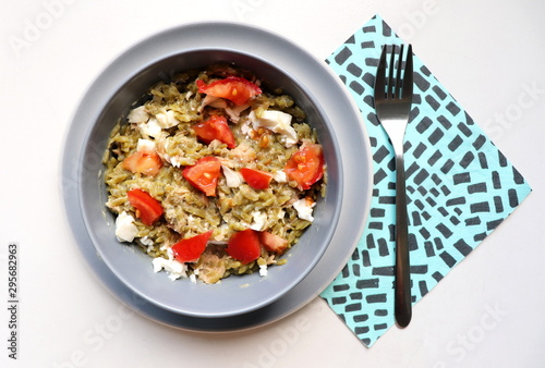 vegetable rice dish with tomatoes and cheese