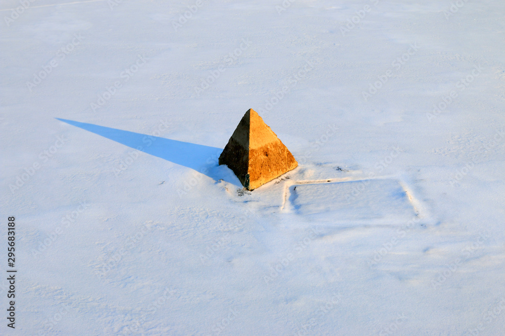 Cement three pyramid in snow