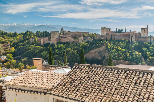 Alhambra palace in Granada, Spain. Sierra Nevada mountains visible.