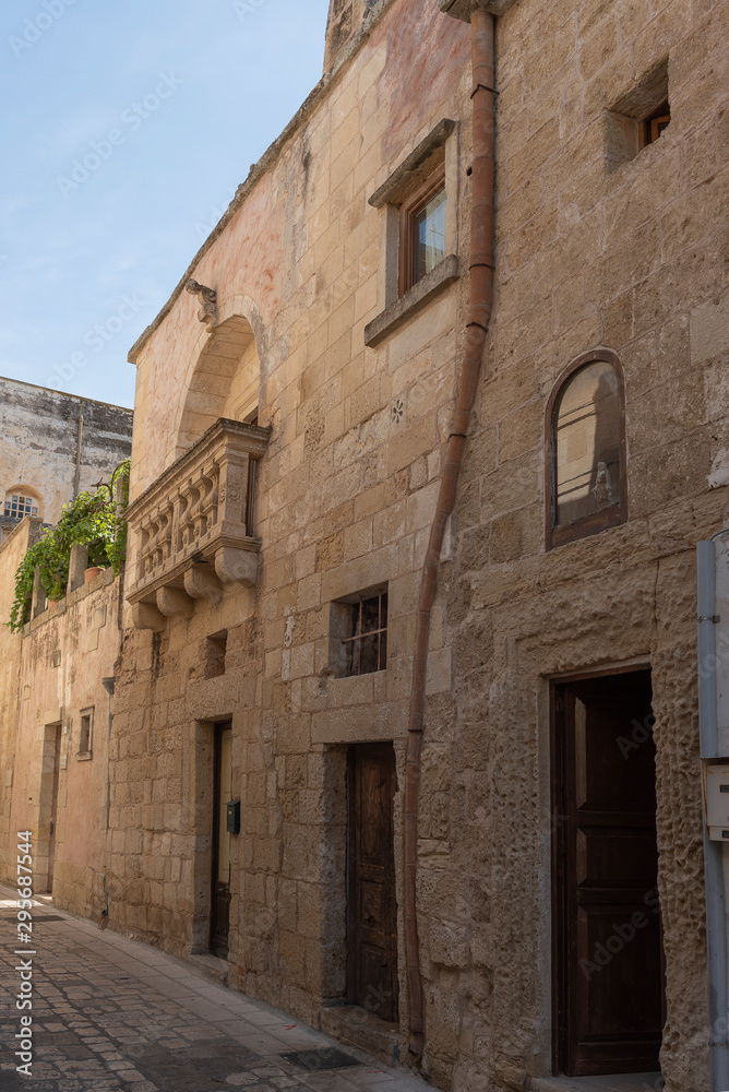 Martano, Messapian city. Salento, Puglia Italy, view of alleys and buildings. September morning.