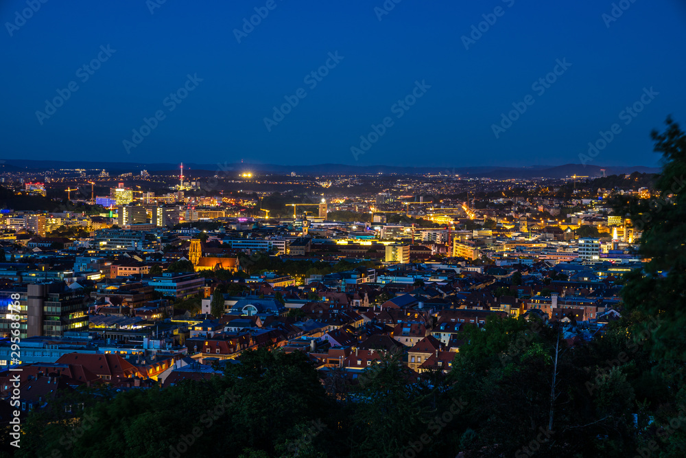 Germany, Night lights of illuminated skyline and cityscape of downtown stuttgart city, aerial view from above by night Germany, Night lights of illuminated skyline and cityscape of downtown stuttgart city, aerial view from above by night