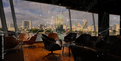 Bangkok city view point from Lounge interior. overlooking a magnificent cityscape blue sky and city in Thailand and wireless network low poly line.