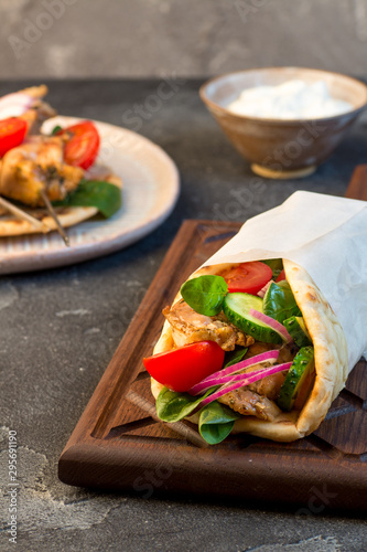 Souvlaki with vegetables wrapped in pita