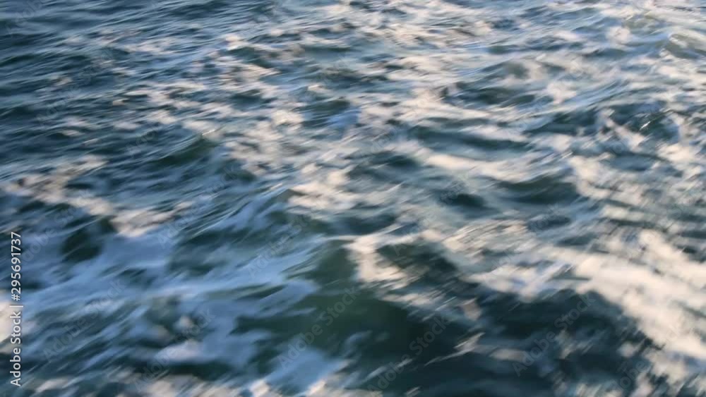Sailing on the sea and waves, sea surafce view from the boat, wavy sea Sailing on the sea and waves, sea surafce view from the boat, wavy sea