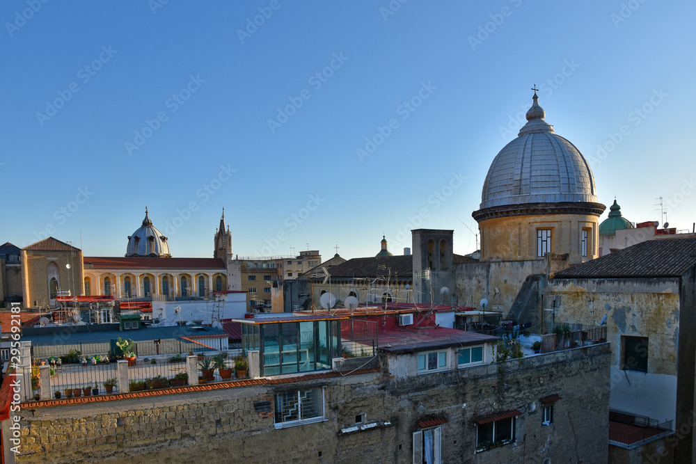 Naples, Italy, 12/10/2019. Domes of churches on the terraces and on the roofs in the historic city center