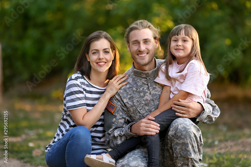 Happy military man with his...