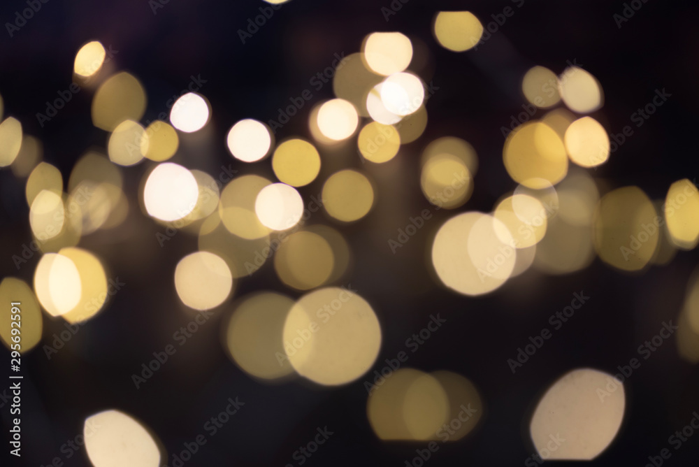 Christmas light background. Holiday glowing backdrop. Defocused background, blurred bokeh. Background or texture for your design Christmas light background. Holiday glowing backdrop. Defocused background, blurred bokeh. Background or texture for your design