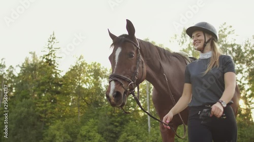 Magnificent walk with a horse in nature photo