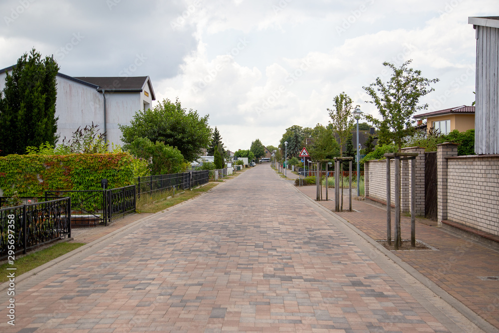 Fototapeta premium A road in the small seaside resort of Zempin on the island of Usedom in wonderful tranquility.