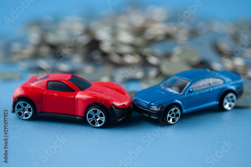 toy car crashed into coins