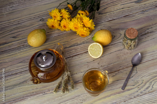 Useful herbal tea with a plant (Sideritis scardica) and lemons close-up