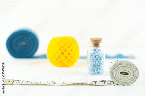 sewing supplies on white background