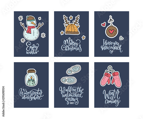 Winter and Christmas vector card set. Calligraphy lettering greeting text and cartoon doodle holiday illustrations. Happy New year poster collection. Enjoy winter, Merry Christmas, I love you snow. photo