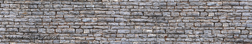 Texture of a old castle stone wall masonry background.