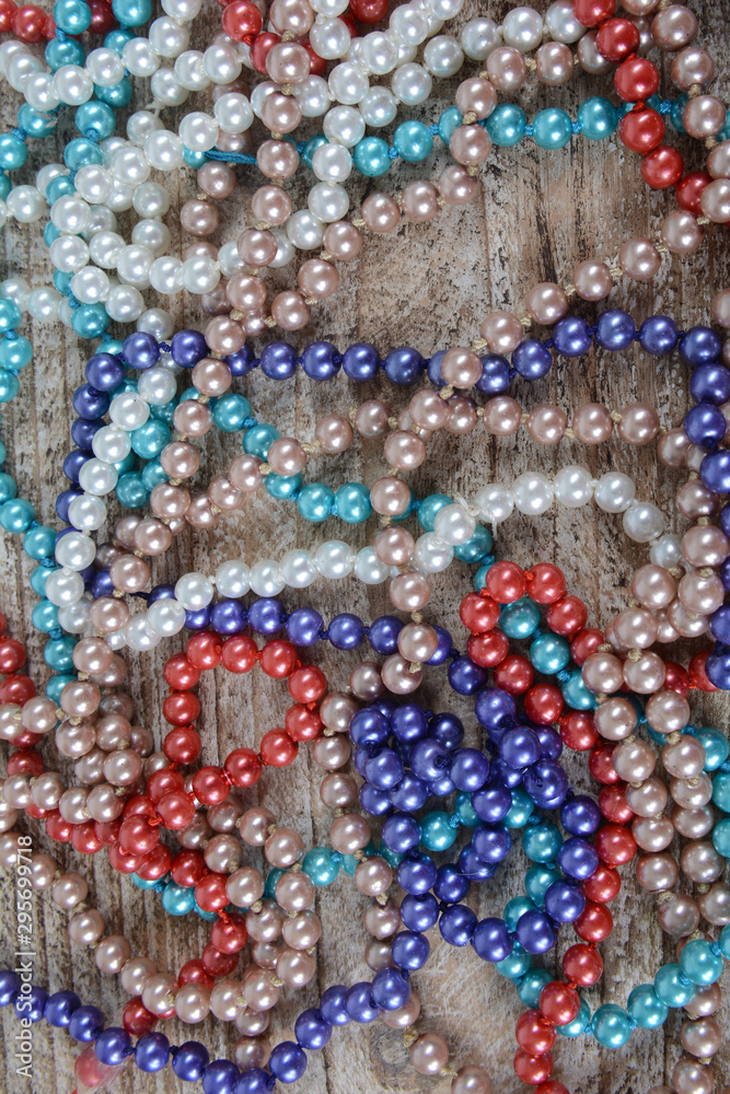 Background of colorful beads on the table.