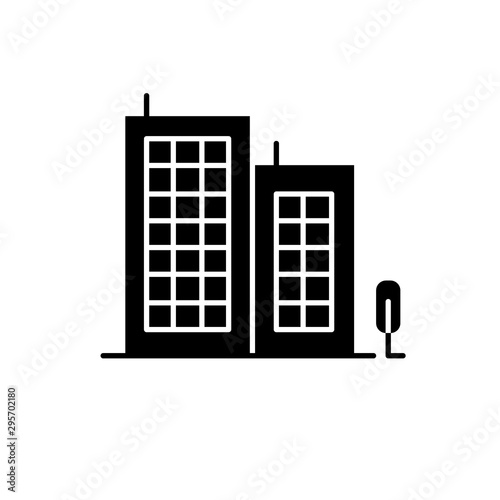 Multi-storey building glyph icon. Apartment houses and tree. Multistorey housing. Silhouette symbol. Negative space. Vector isolated illustration