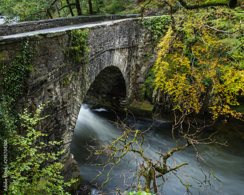 Stone Bridge over The Glaslyn River at Aberglaslyn, Snowdonia national Park, North Wales photo