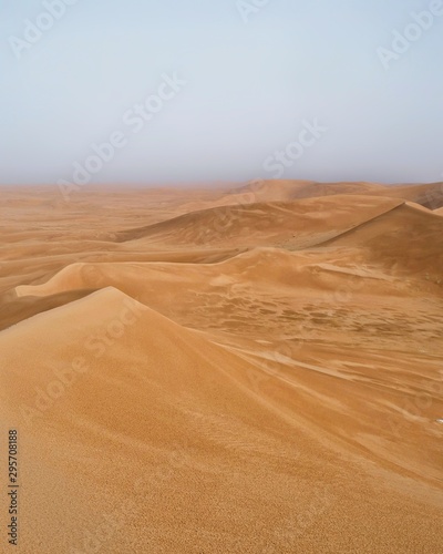 The shifting sand dunes of the Dahna Desert in Riyadh, Saudi Arabia after a night's rain photo