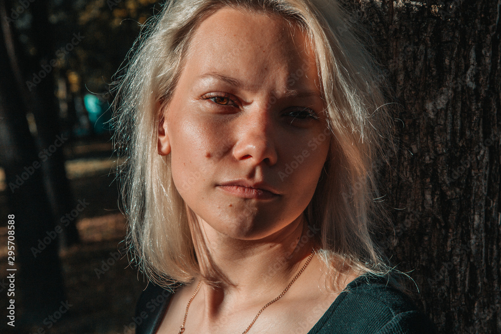 portrait of a blonde in the autumn sun portrait of a blonde in the autumn sun